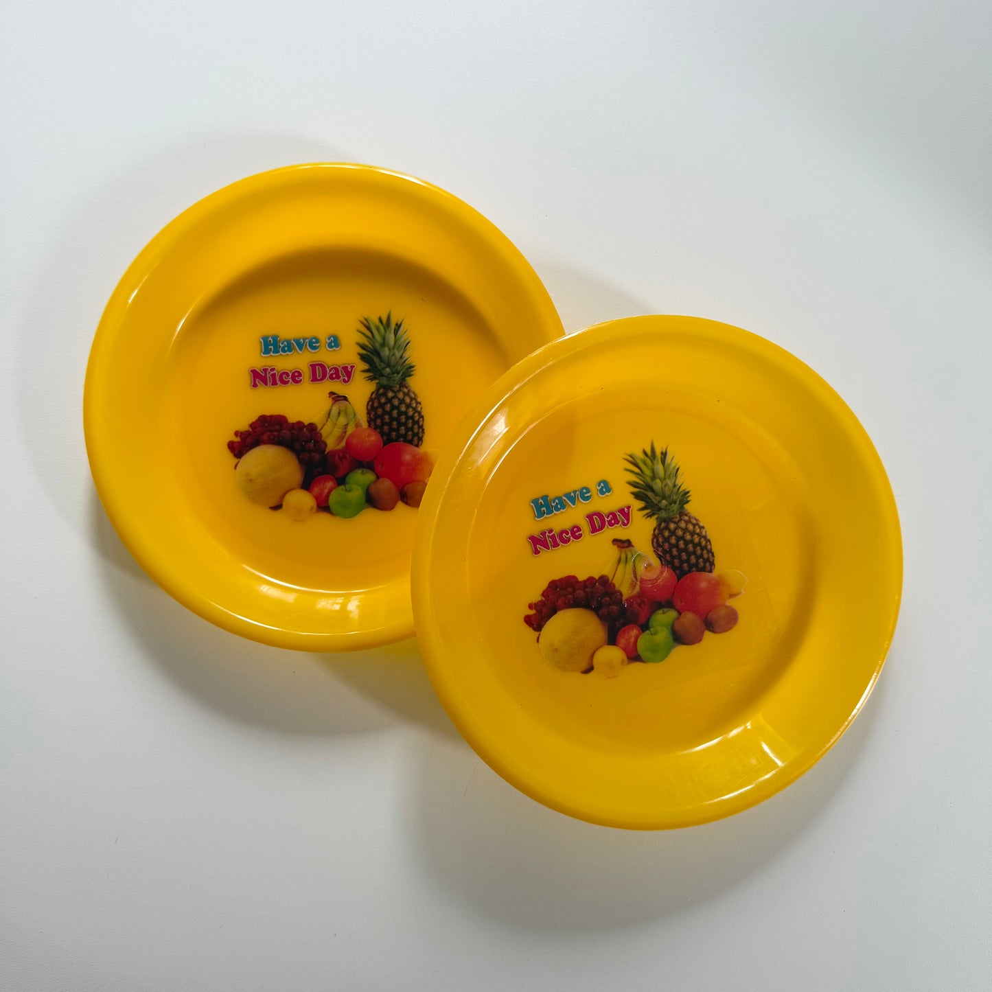Yellow fruit plastic plates x 2