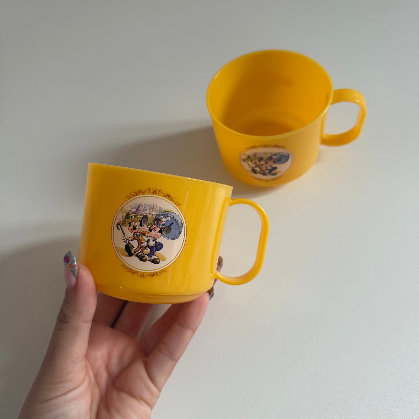 Set of two mickey & Minnie Disney plastic yellow cups