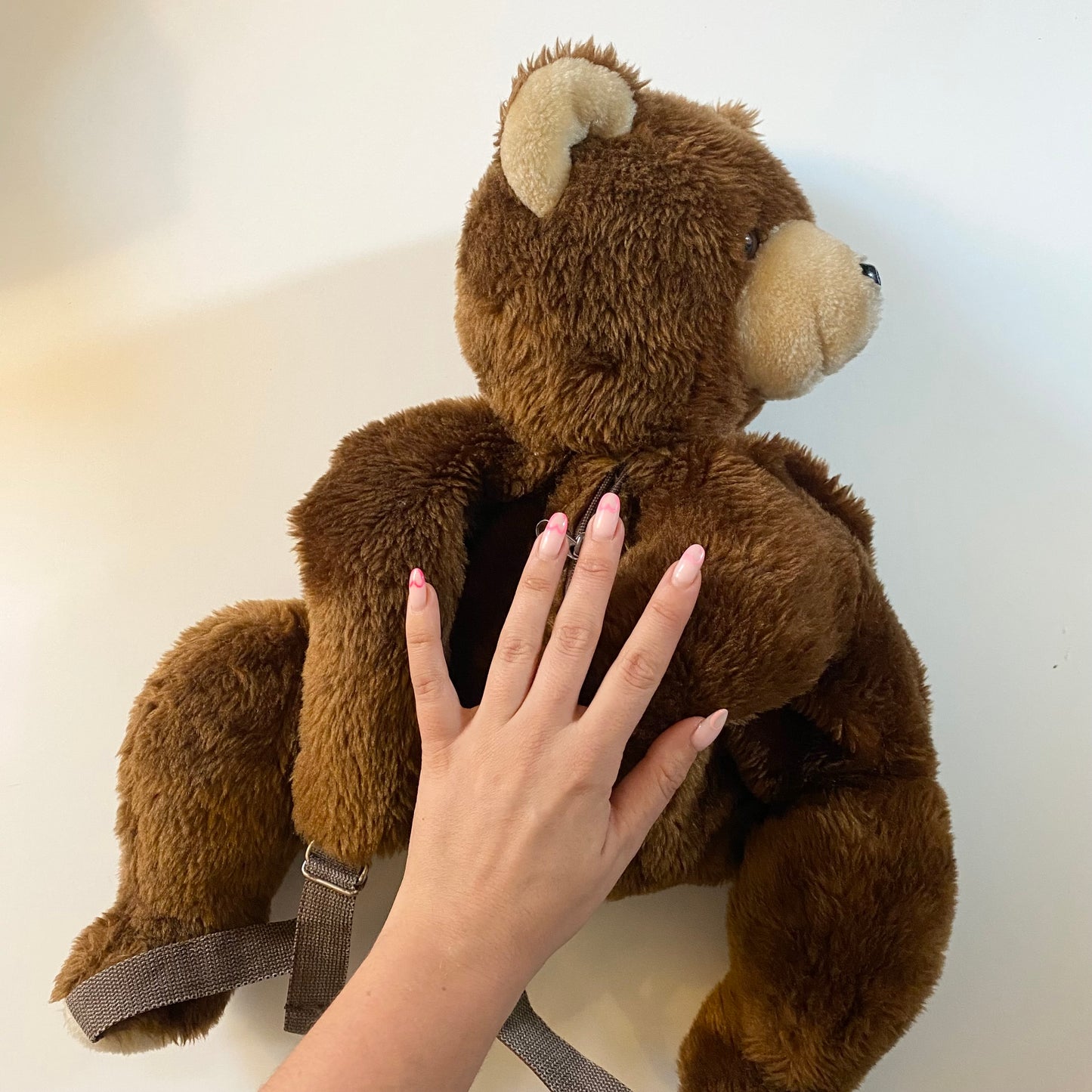 Vintage dark brown teddy bear rucksack.