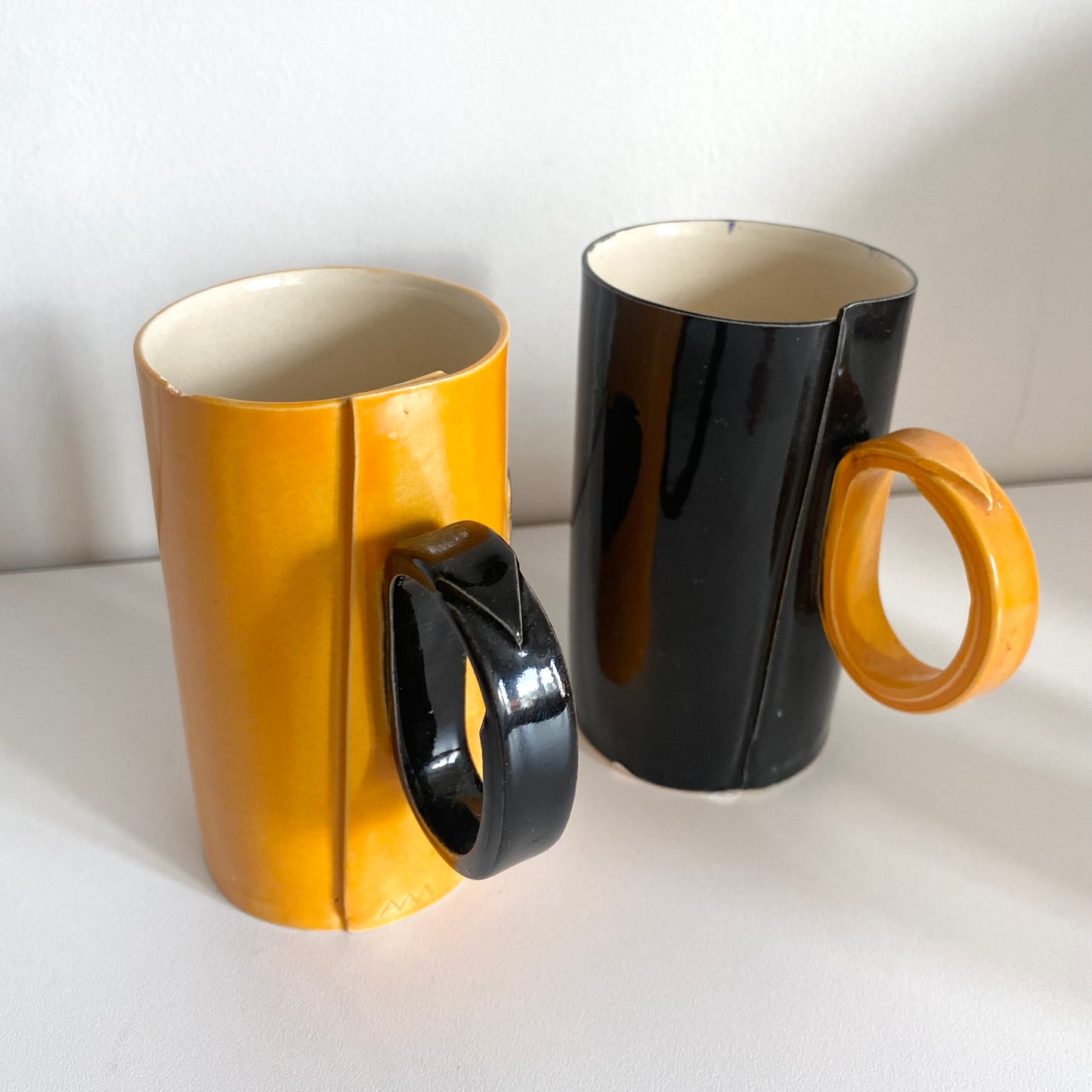 Vintage melamine orange & black unique mugs.