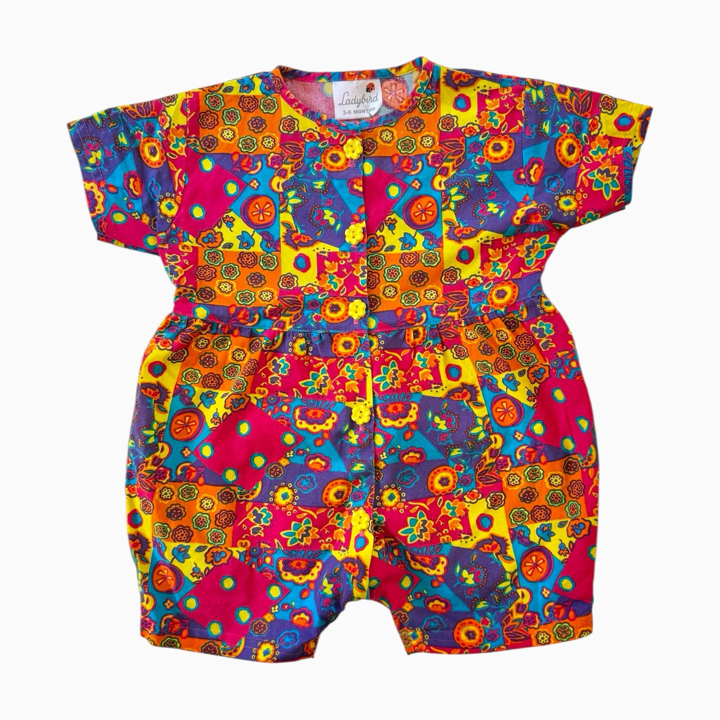 Vintage 90s ladybird patterned romper. Label says size 3-6 months but I think it comes up bigger!