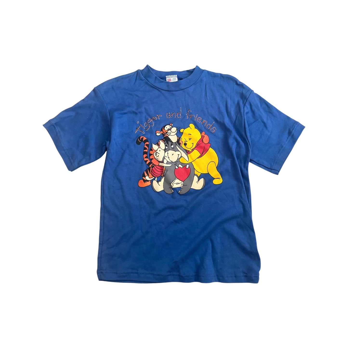Winnie the Pooh tshirt. Size approx 6-7 years