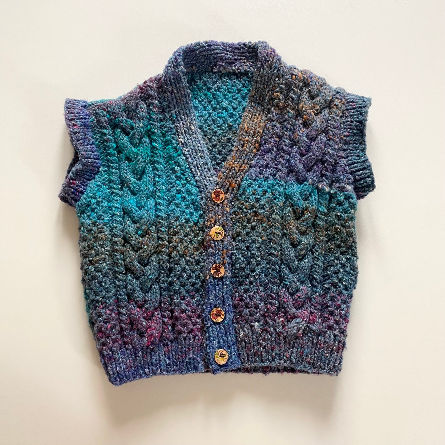 Vintage knitted sleeveless jacket. Approx 18m - 2 years