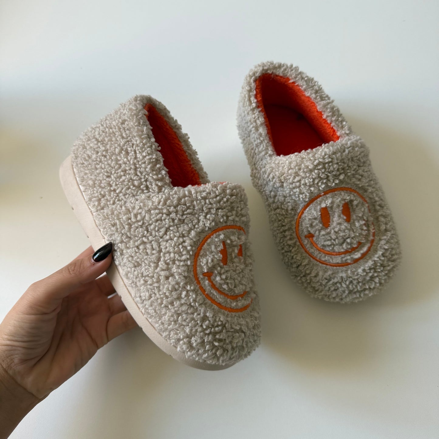 Smiley face slippers. Size 2