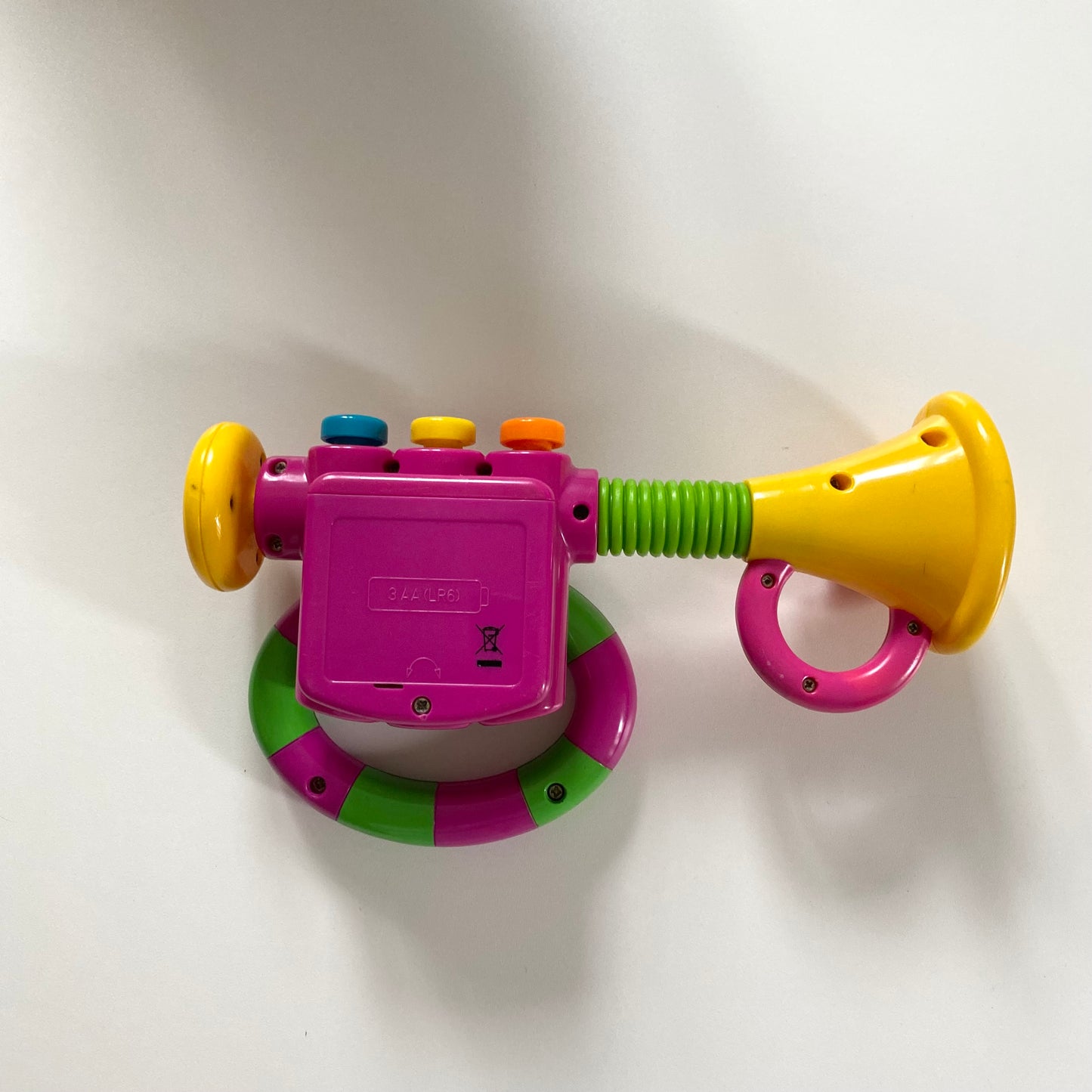 Vintage Barney trumpet sound toy.