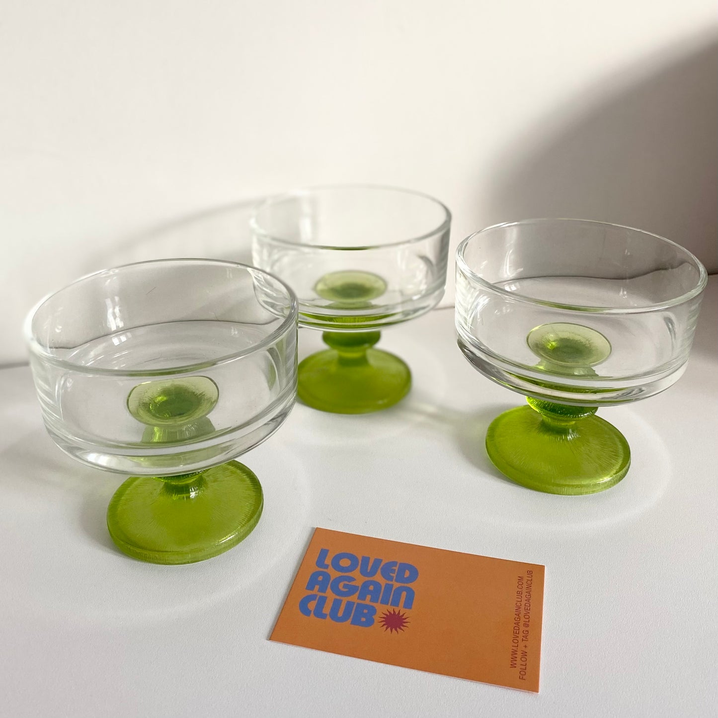 Bottle green vintage glass desert dishes. Set of three