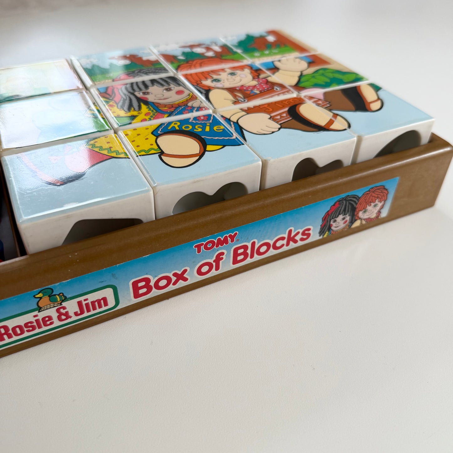 Vintage Rosie and Jim box of blocks. Has two puzzles and a shape game too.