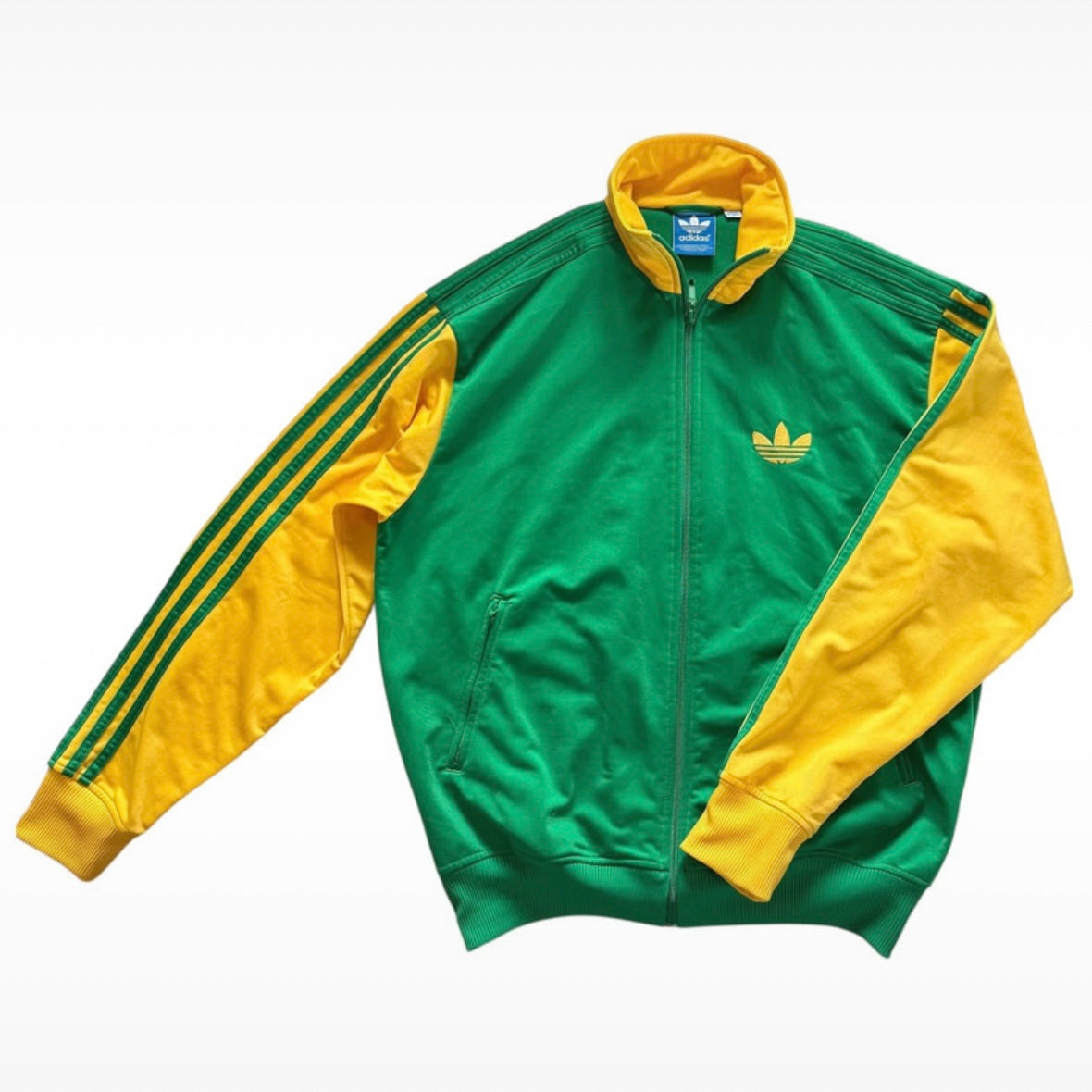 Vintage adidas green & yellow track jacket. Size M