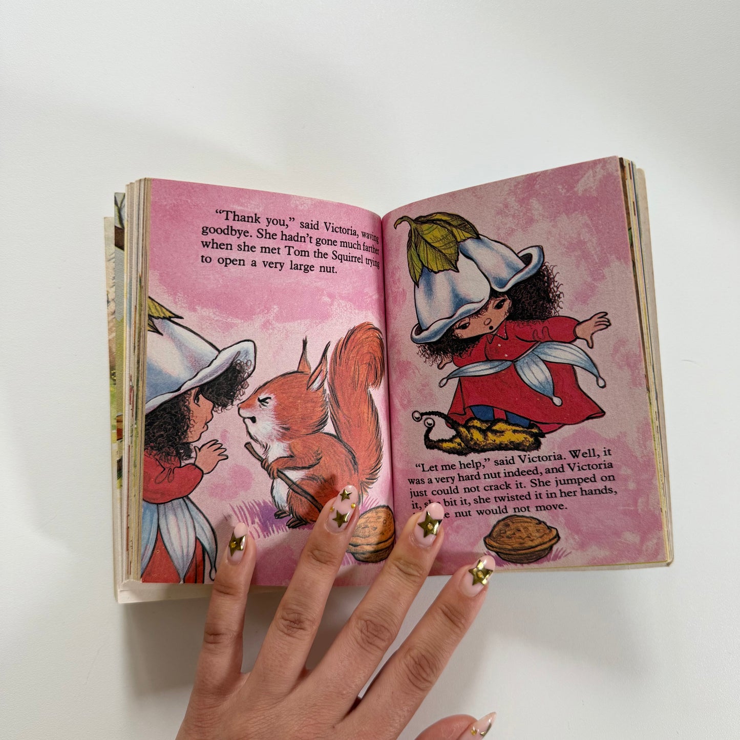 Vintage 1982 small Victoria plum book. Rip on the front