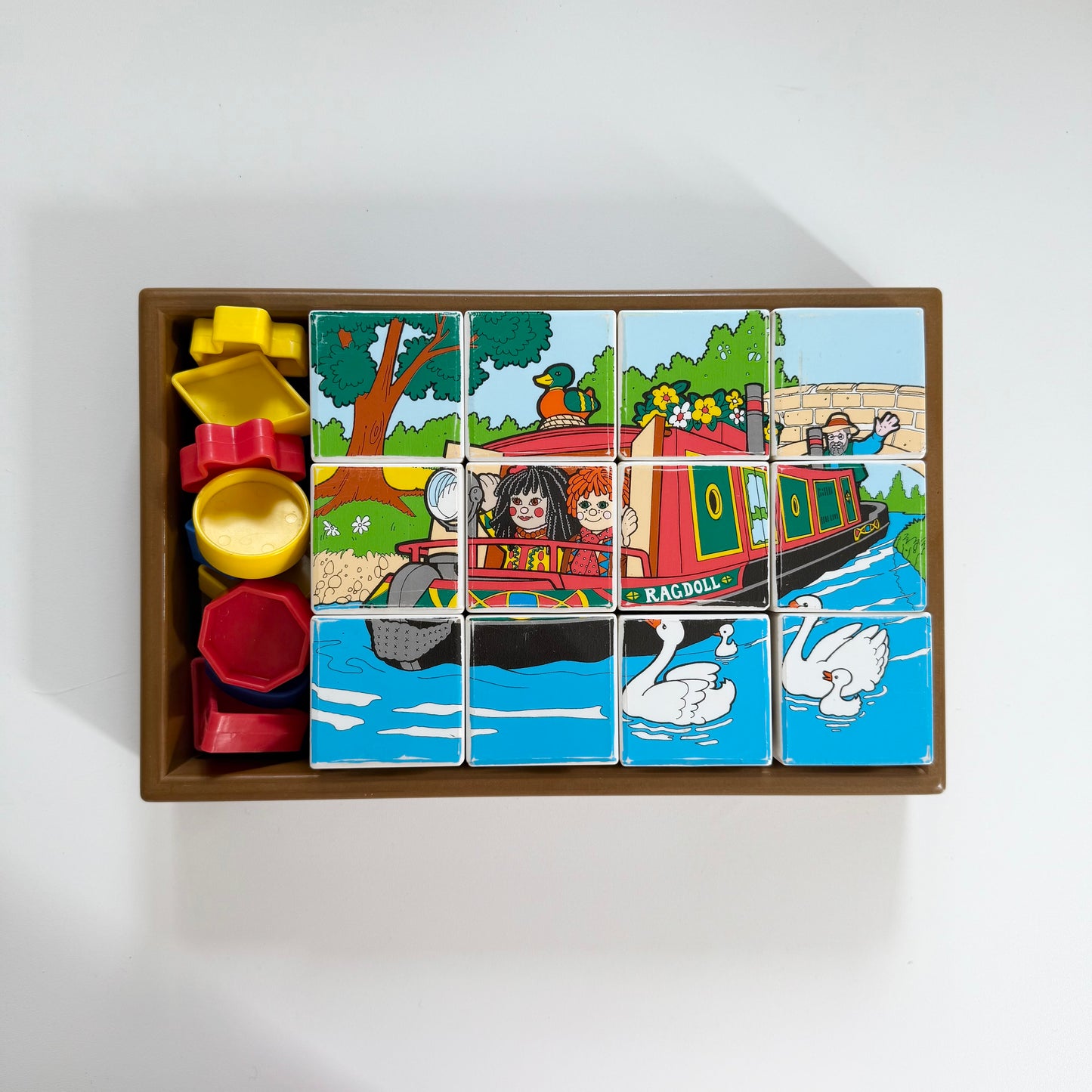Vintage Rosie and Jim box of blocks. Has two puzzles and a shape game too.