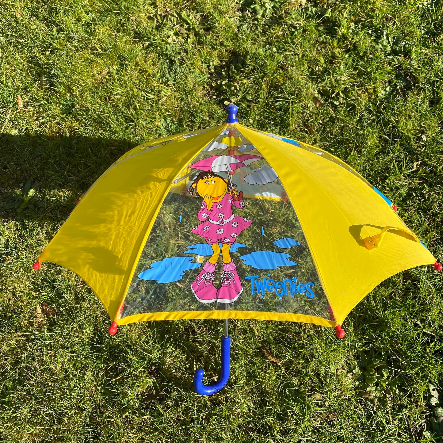 Vintage Tweenies colourblock umbrella. Has signs of use