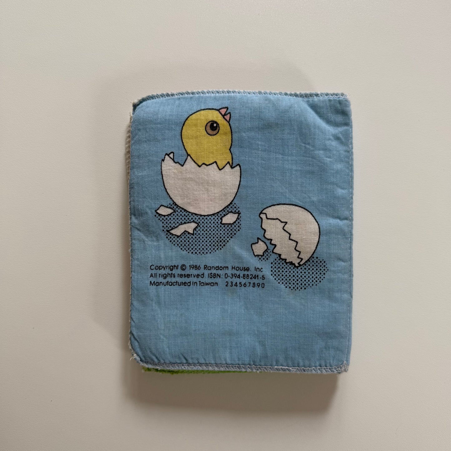 Vintage 1986 random house soft toy toddler book. One page has pen mark