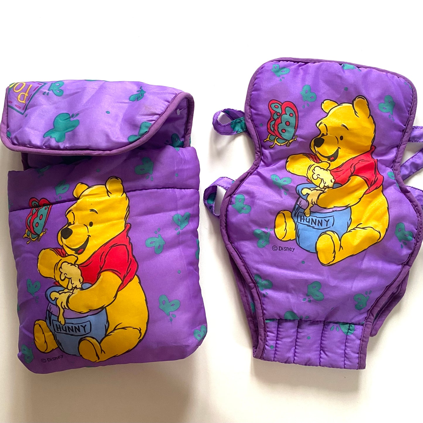 Vintage Winnie the Pooh toy baby carrier & bag for dolls. Has a pram hood inside the bag too.