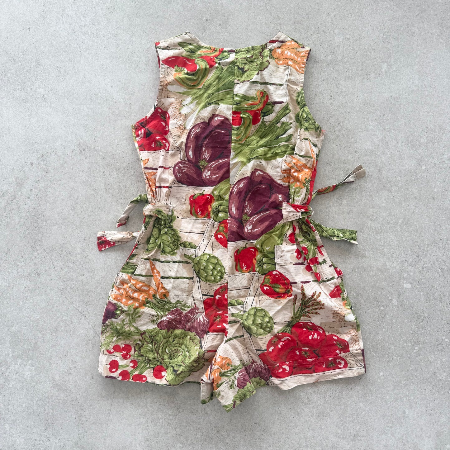 Vintage romper in vegetable garden print. Size approx 6-8 years