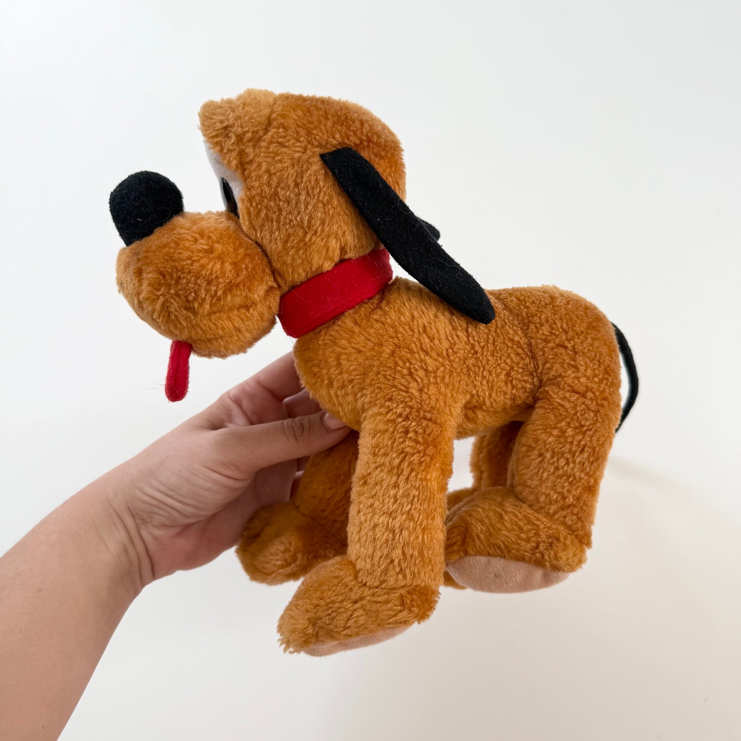 Vintage Pluto plush toy.