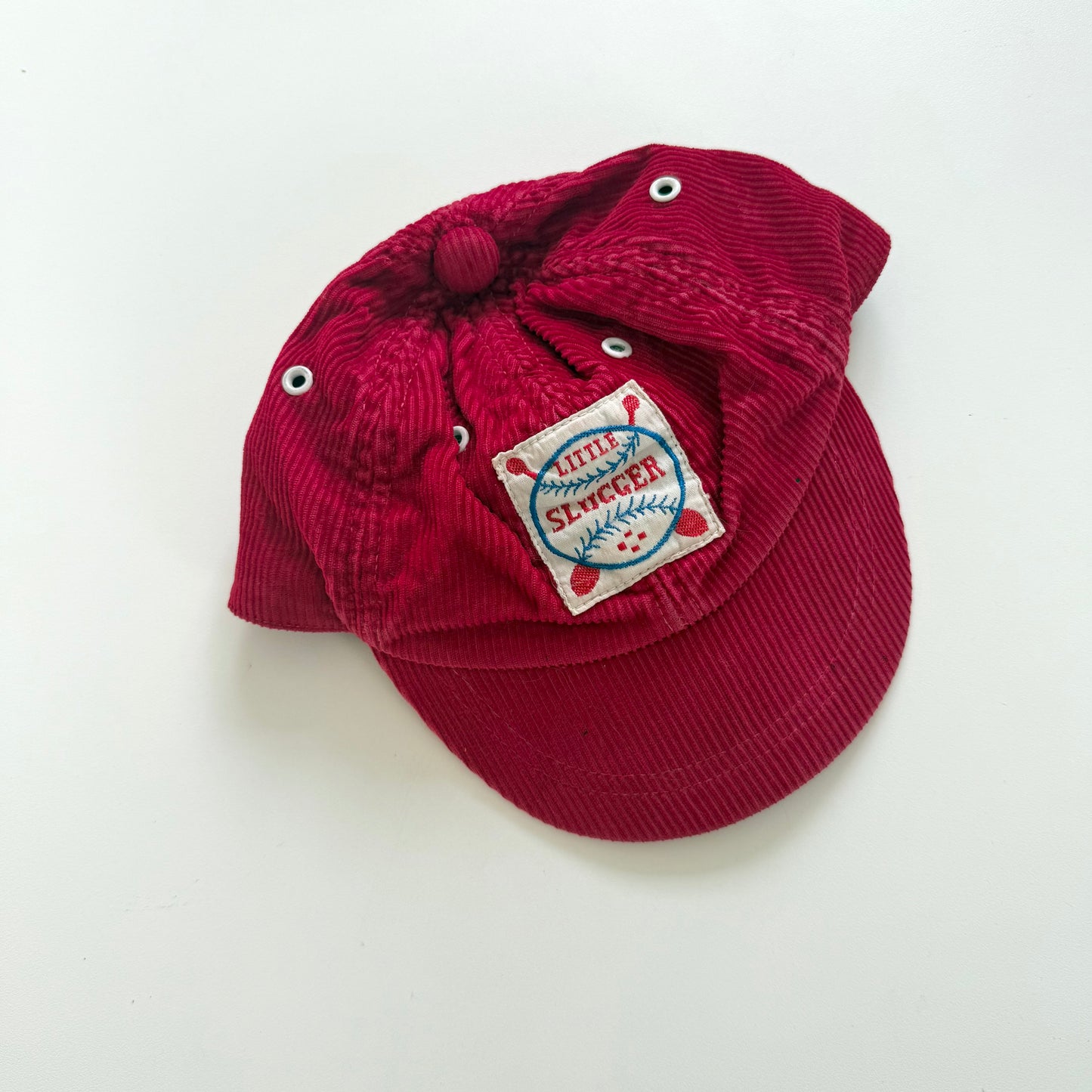 Vintage red corduroy cap. Size approx 12-18 months