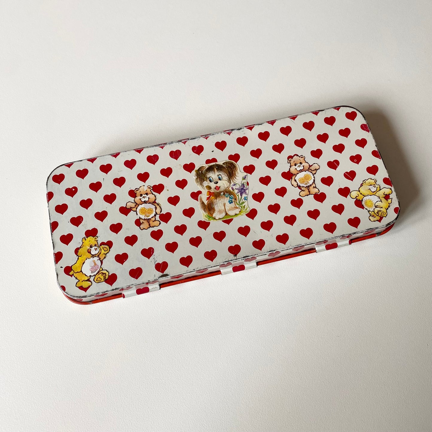 Vintage pencil case tin with original stickers.