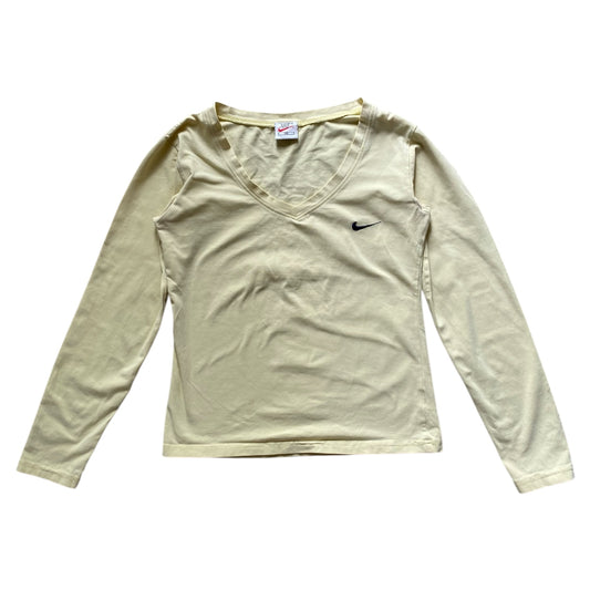 Vintage Nike pale yellow long sleeved top. Some tiny holes in one sleeve. Not noticeable on. Size S/8-10.