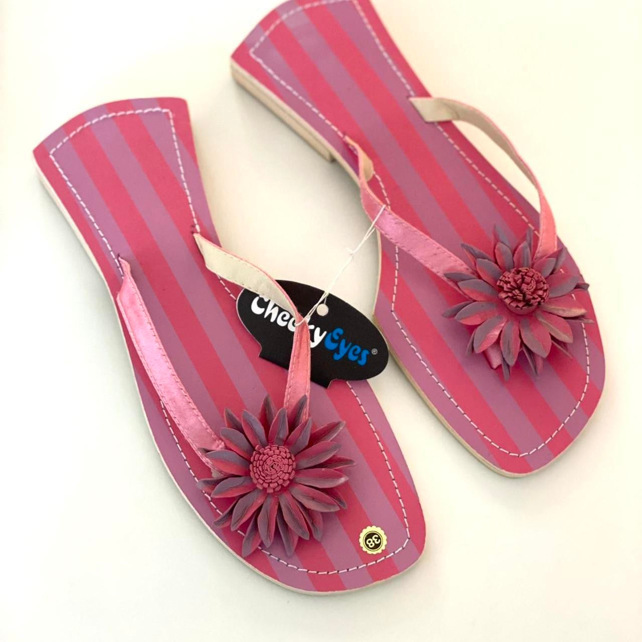 Y2K style summery pink flip flops with flower design. BNWT

Size 38/5.
