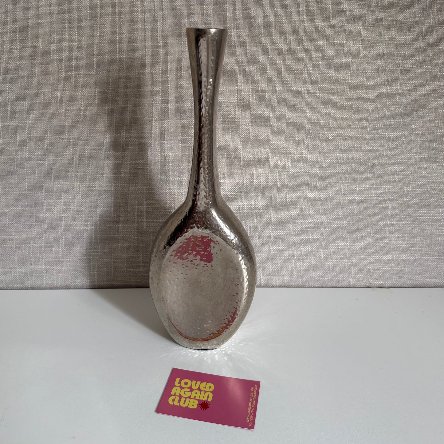 Vintage mid century hammered silver vase.