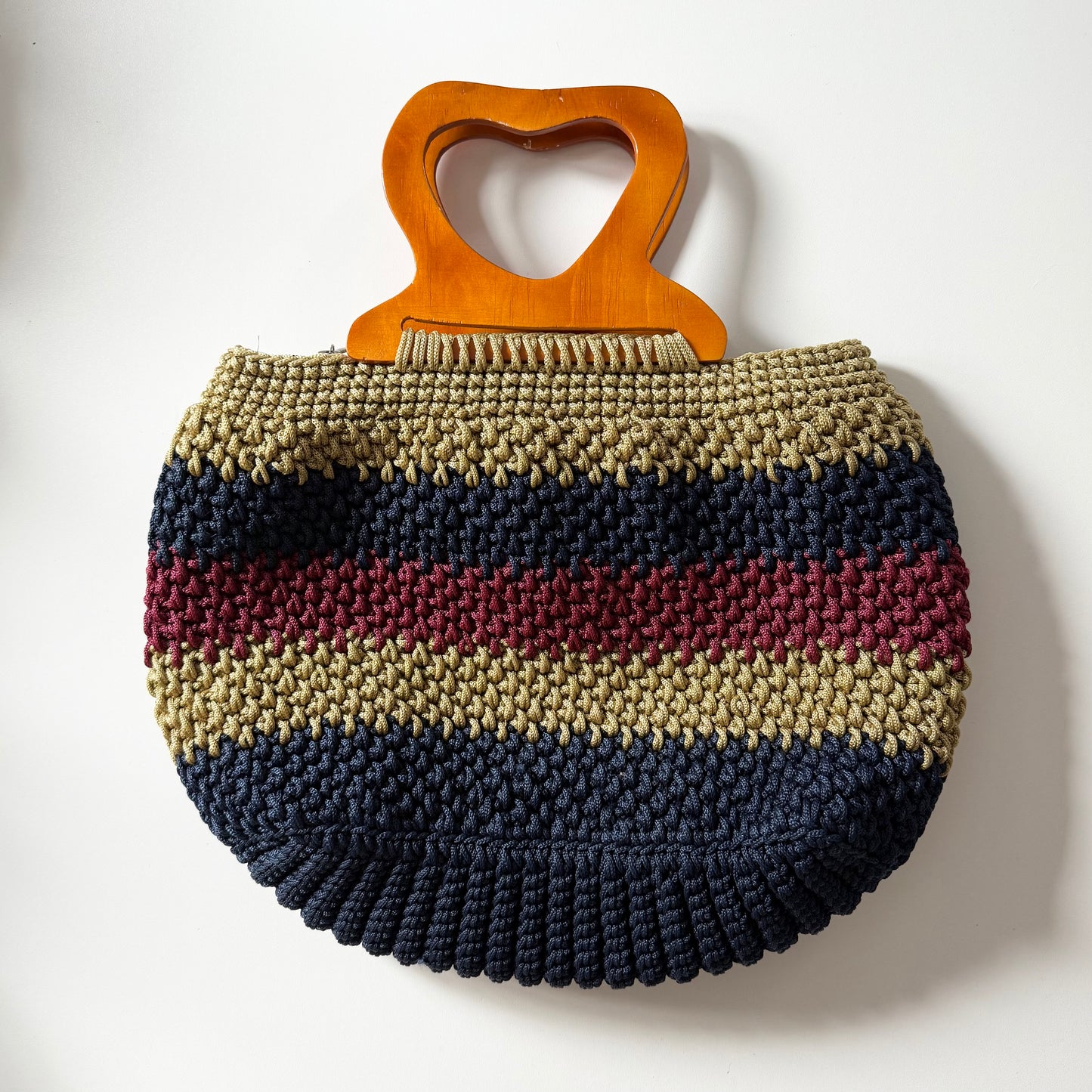 Vintage summery woven striped basket bag with wooden handle.