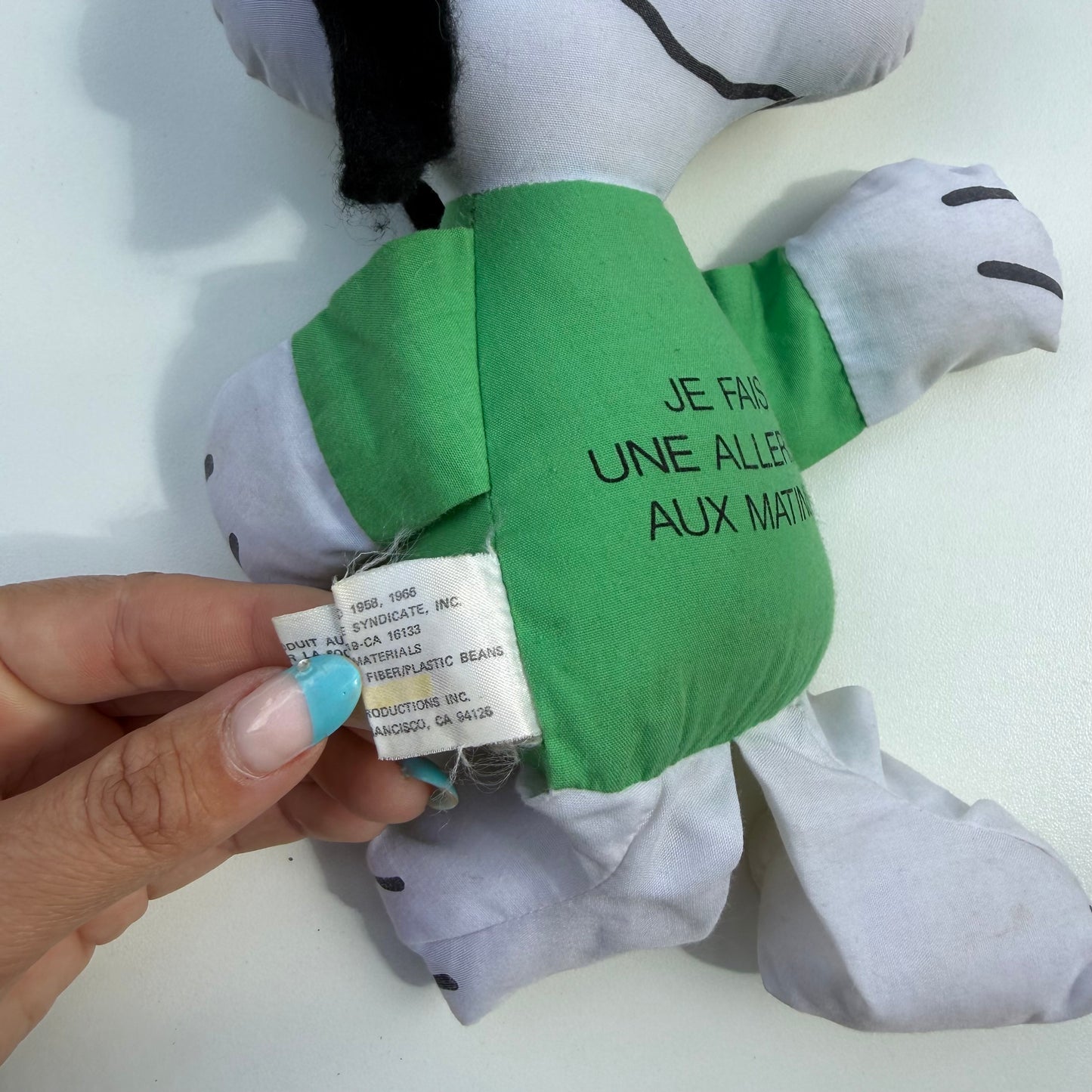 Vintage 1966 Snoopy plush toy with French text