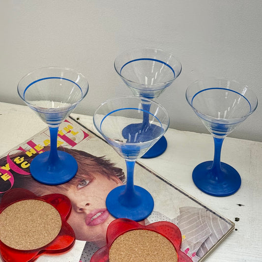 Vintage cocktail glasses with blue stems
