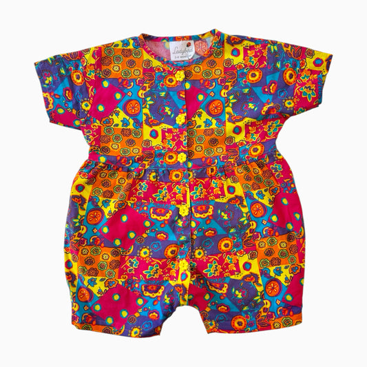 Vintage 90s ladybird patterned romper. Label says size 3-6 months but I think it comes up bigger!