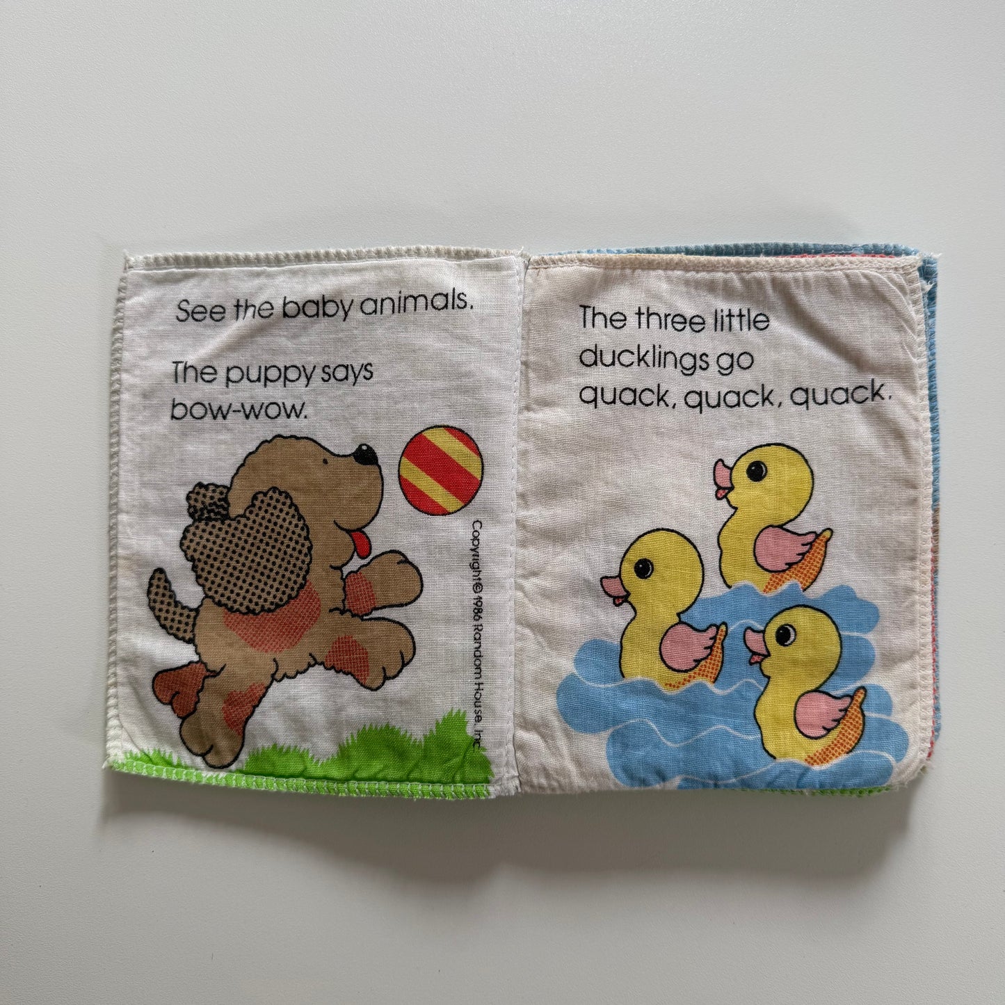 Vintage 1986 random house soft toy toddler book. One page has pen mark