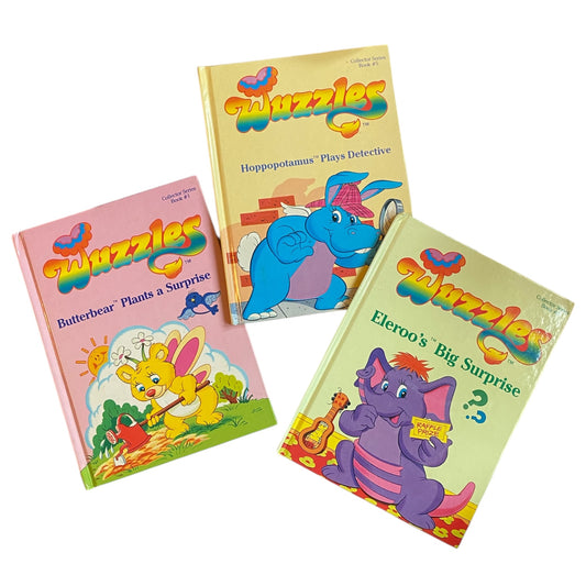 Set of 3 vintage wuzzles books