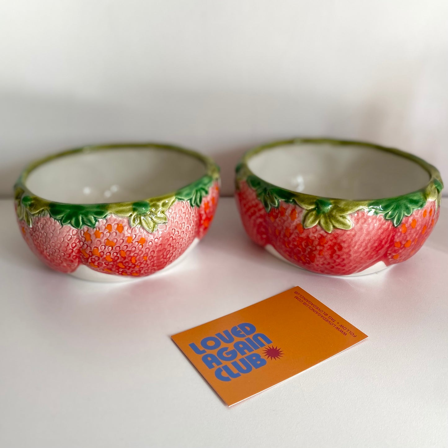 Set of two vintage ceramic strawberry fruit bowls.