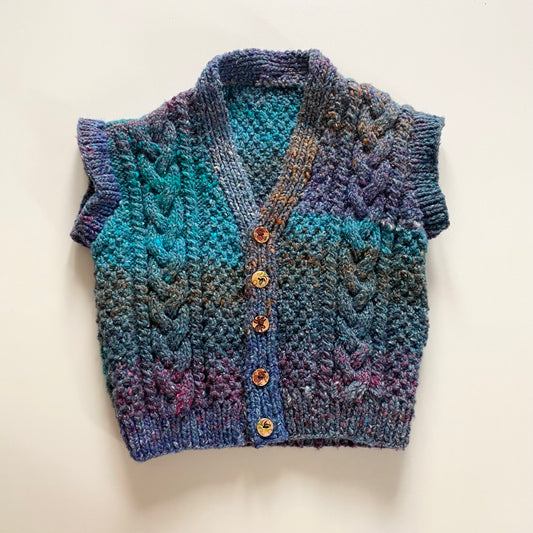 Vintage knitted sleeveless jacket. Approx 18m - 2 years