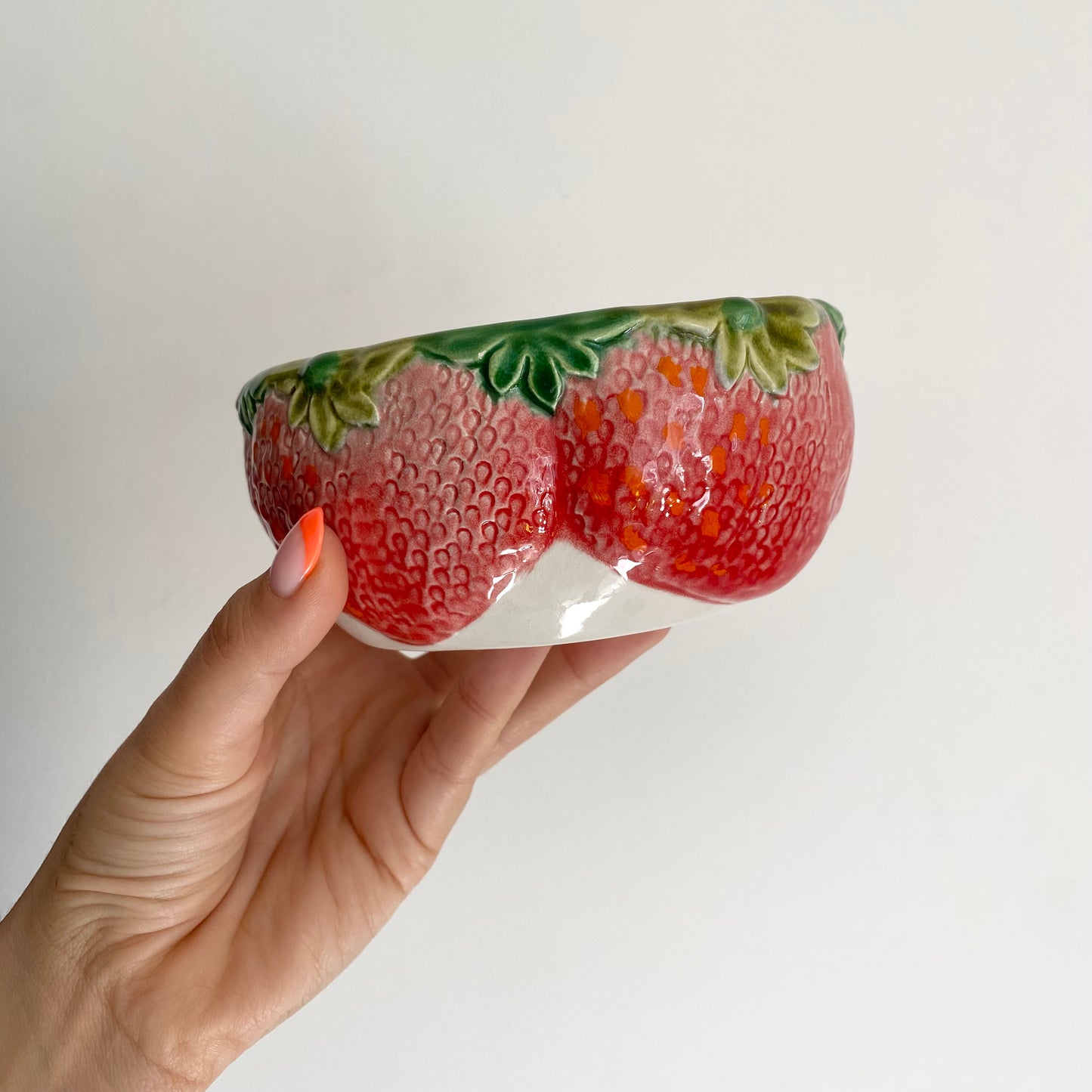 Set of two vintage ceramic strawberry fruit bowls.