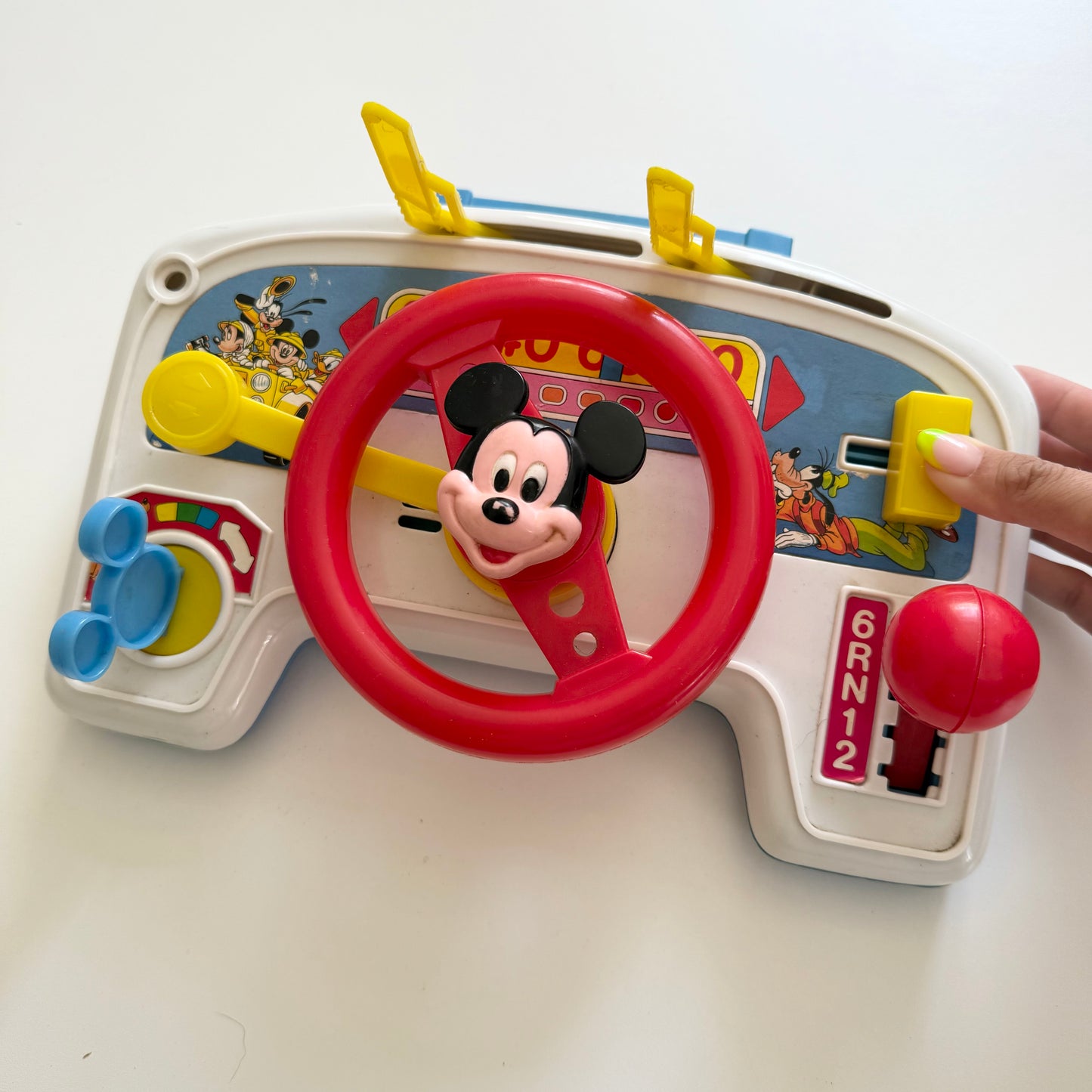 Vintage Disney carry around driver toy. Signs of wear.