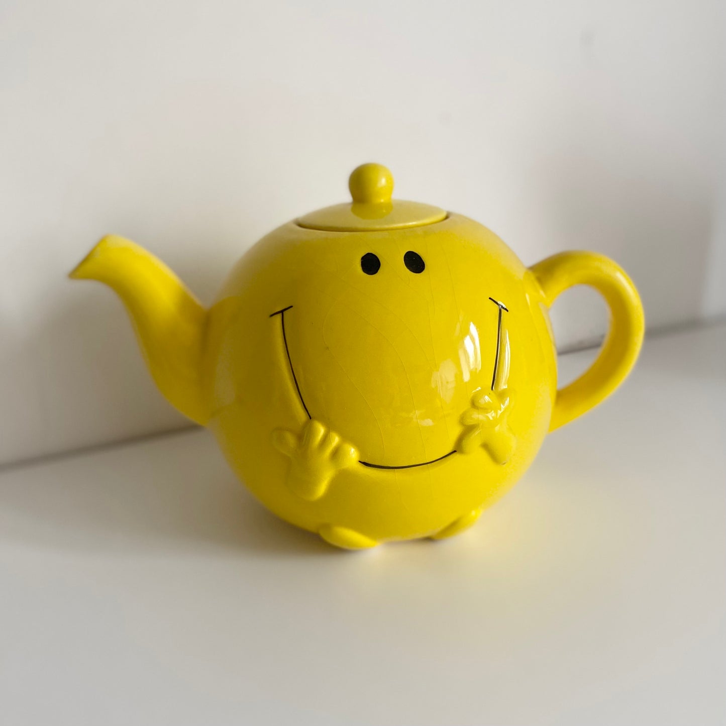 Mr happy smiley face 2014 ceramic teapot.