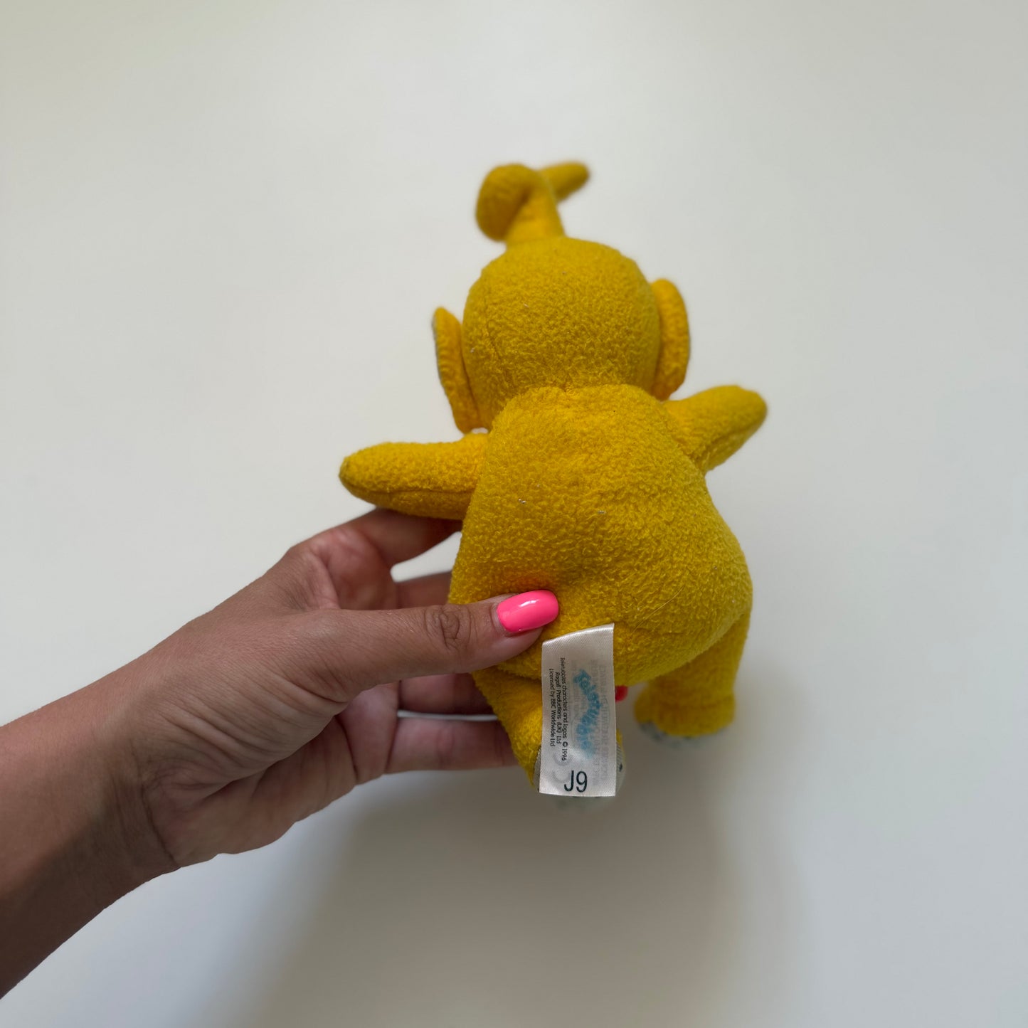 Vintage 1996 Laa laa the Teletubbies plush doll. Small size