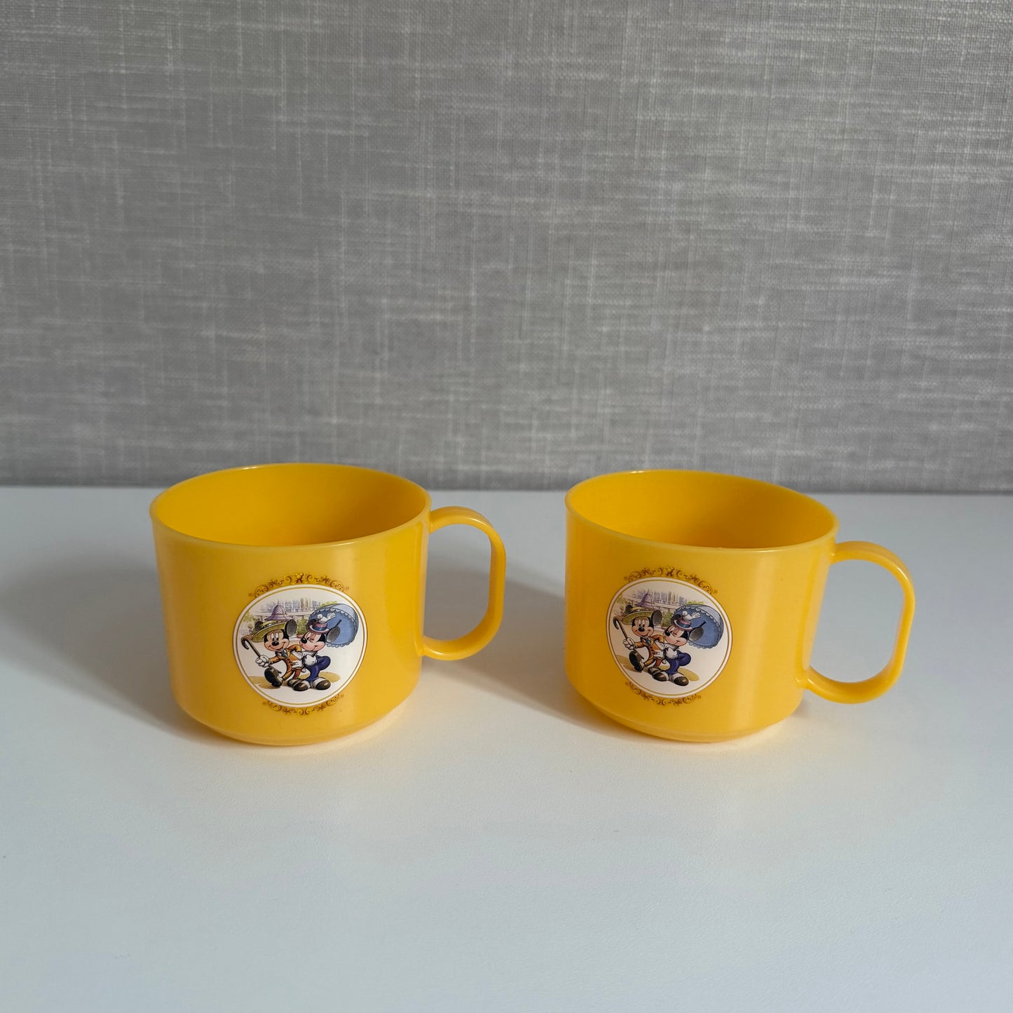 Set of two mickey & Minnie Disney plastic yellow cups