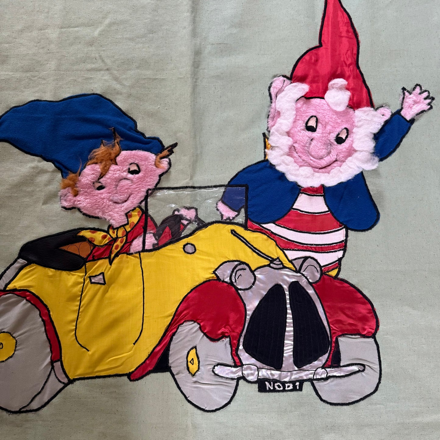 Handmade noddy wall hanging. Has little quirks. Condition as shown.
