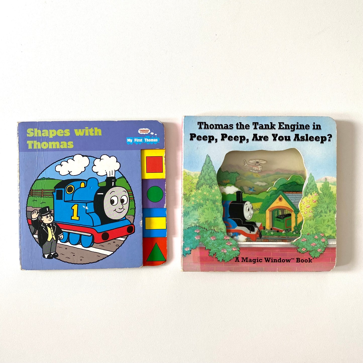 Two vintage mini Thomas the tank books. Has some wear
