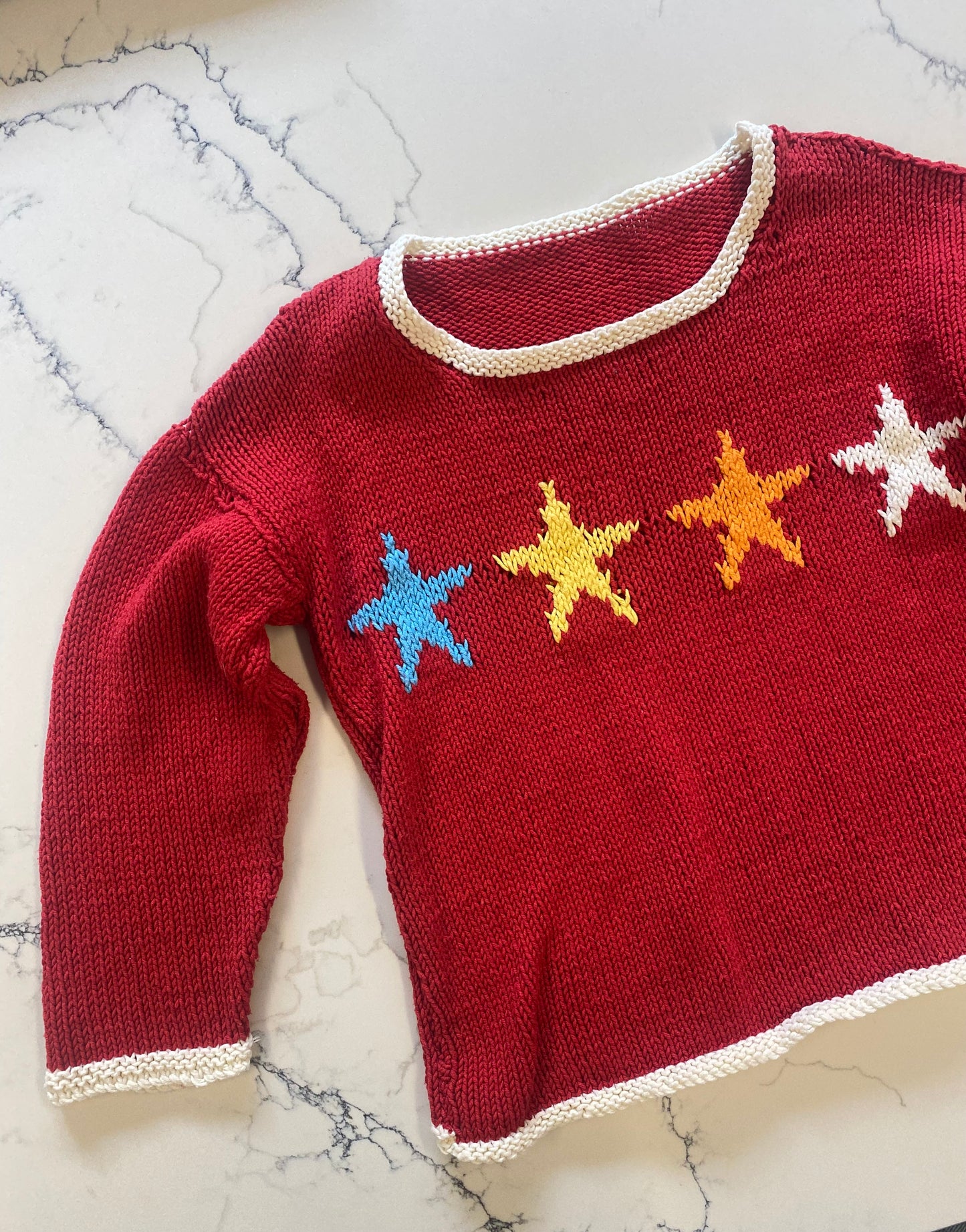 Knitted star jumper age 4/5 years