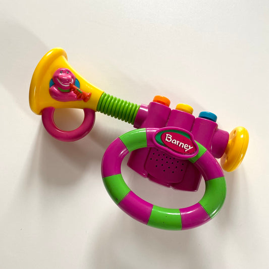 Vintage Barney trumpet sound toy.