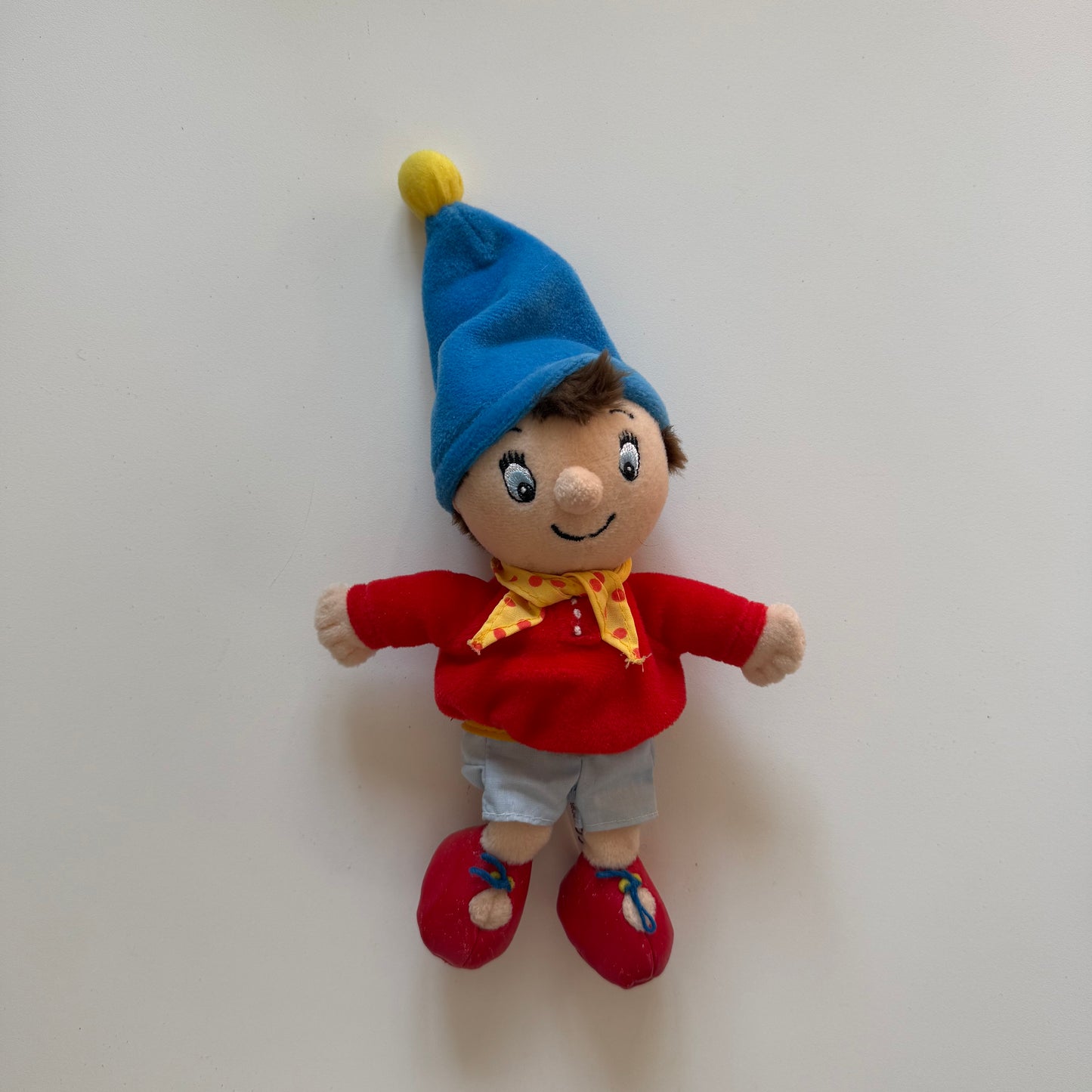 Vintage noddy plush doll with bell in the hat.