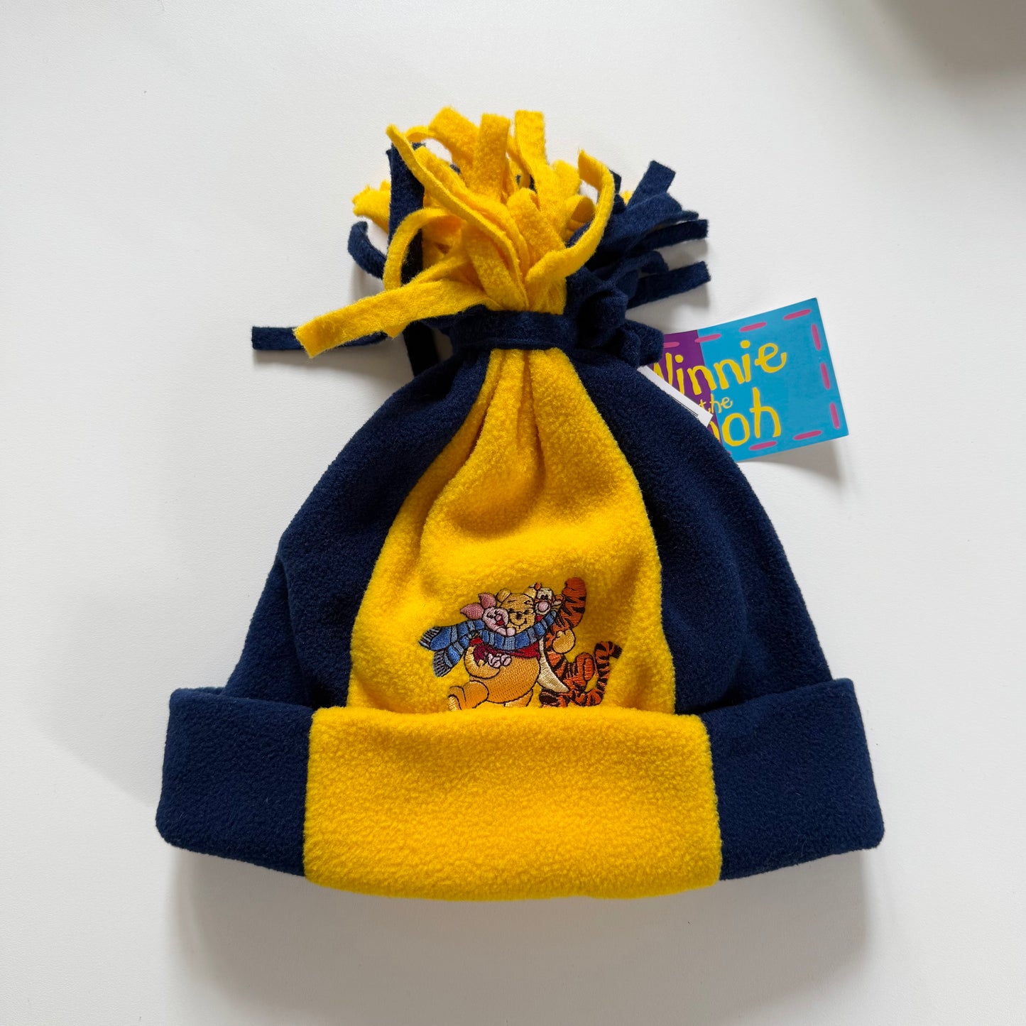 Vintage Winnie the Pooh navy & yellow fleece hat. Size 1-2 years