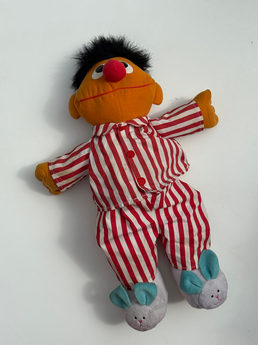Vintage 1996 Sesame Street “Sing & Snore Ernie” plush doll featuring striped pajamas and bunny slippers. Medium size. Has some marks - don’t want to wash it personally as it has a battery inside. Needs new batteries.