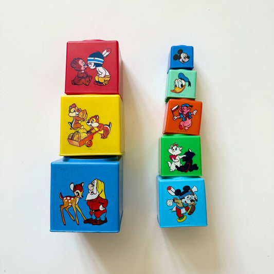 Vintage and Walt Disney stacking boxes.
