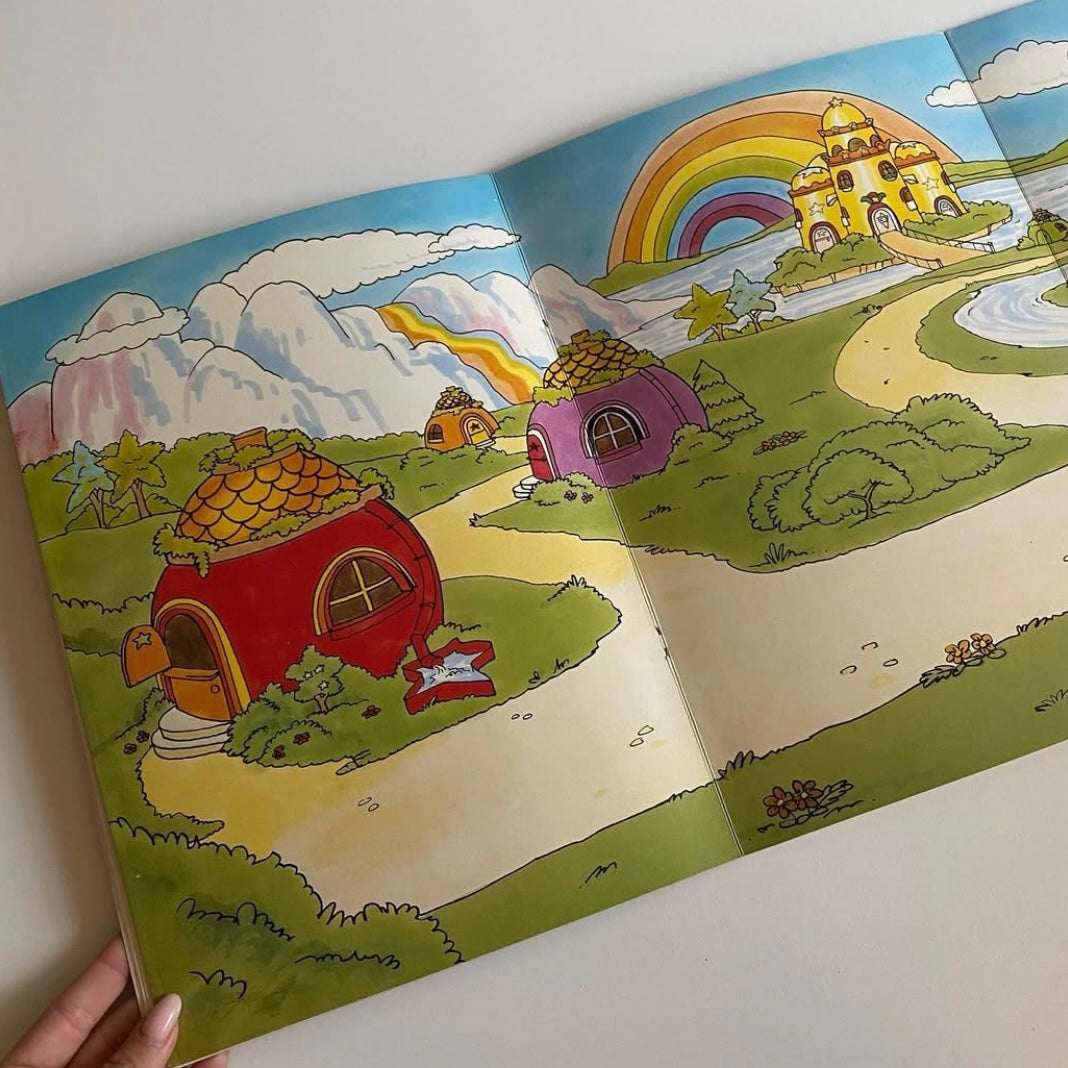 Vintage st Michael 1983 rainbow Brite activity book with press out play set. Has a few drawings but mostly good condition.