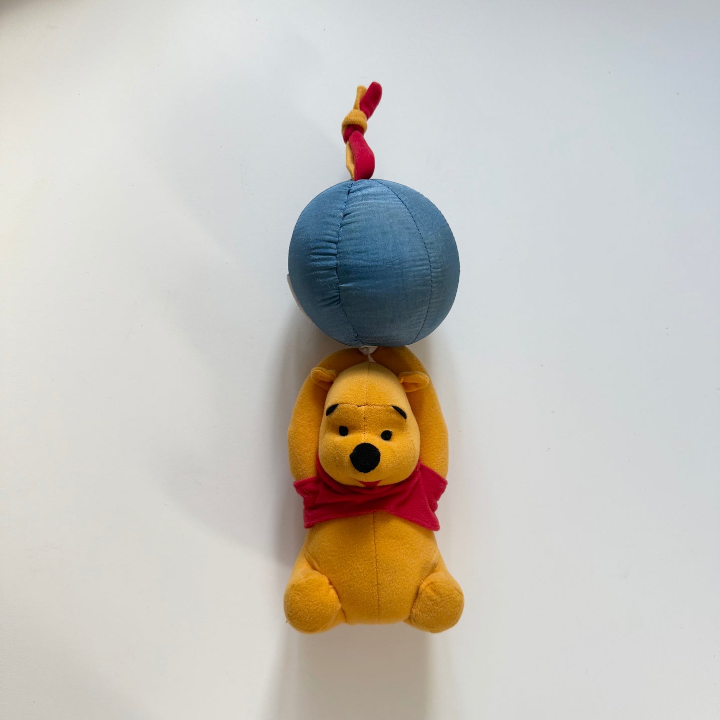 Vintage Winnie the Pooh musical toy. Can clip onto a pram or cot.