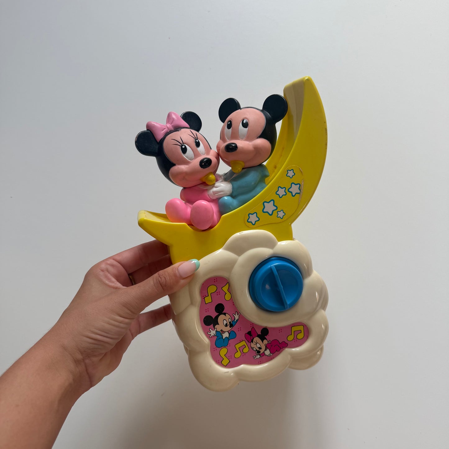 Vintage Disney Mickey & Minnie wind up music box. Can clip onto the side of a cot.