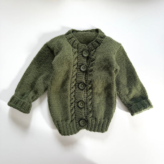 Vintage dark green knitted cardigan. Size approx 6-9 months