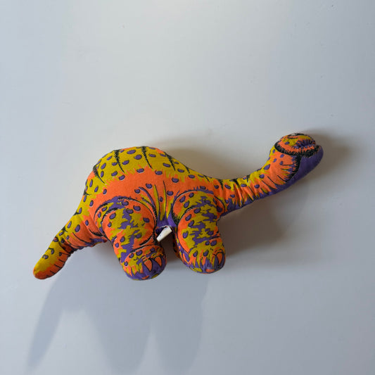 Vintage dinosaur plush doll.